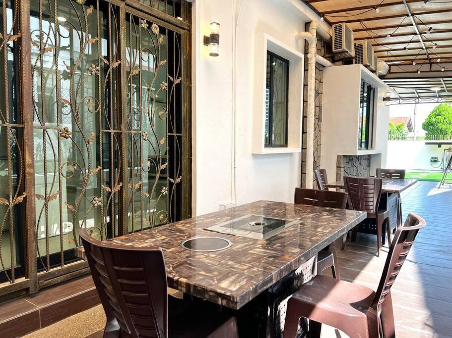 Rumah liburan Kim Teng Park, By Antlerzone